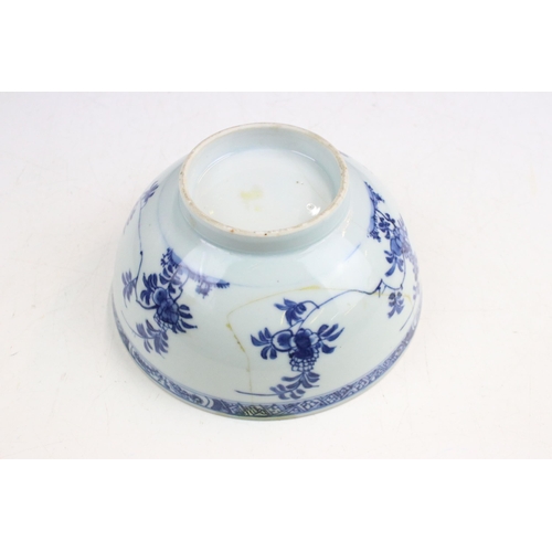 29 - 19th century Chinese blue and white under glazed bowl footed bowl with hand painted florals, border ... 