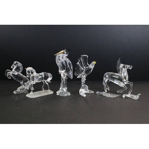 31 - Collection of five Swarovski crystal figurines to include a Pegasus, eagle, horse standing, horse re... 