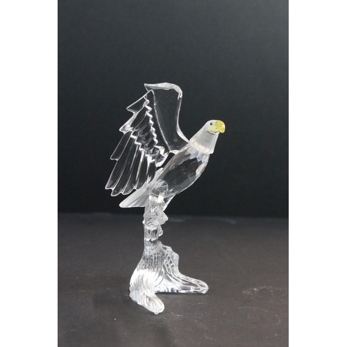 31 - Collection of five Swarovski crystal figurines to include a Pegasus, eagle, horse standing, horse re... 