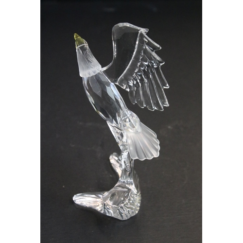 31 - Collection of five Swarovski crystal figurines to include a Pegasus, eagle, horse standing, horse re... 