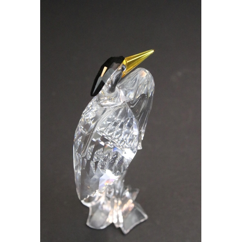 31 - Collection of five Swarovski crystal figurines to include a Pegasus, eagle, horse standing, horse re... 