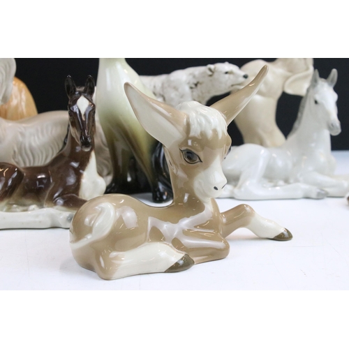 34 - Assortment of ceramic animal figurines, to include Sylvac sausage dog, Sad Sam spaniel and Terrier 1... 