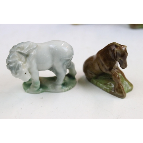 34 - Assortment of ceramic animal figurines, to include Sylvac sausage dog, Sad Sam spaniel and Terrier 1... 