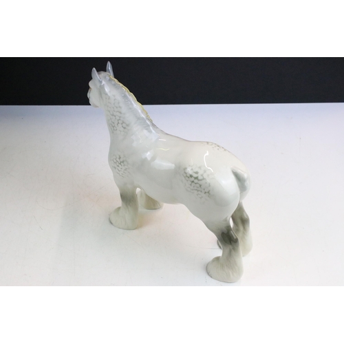 36 - Collection of four Beswick horses to include New Forest Pony, dapple grey standing Shire horse and s... 