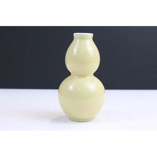 Pair of Chinese turquoise lined dishes with Famille Rose outer hand