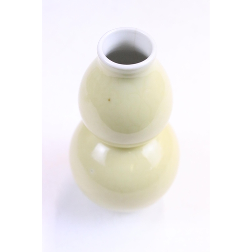 Pair of Chinese turquoise lined dishes with Famille Rose outer hand