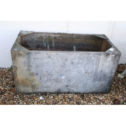 554 - 20th century galvanised steel studded water trough, H 62cm, W 121cm , D 61cm