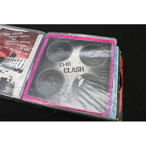 1028 - Vinyl - 18 The Clash 7” singles spanning their career including foreign pressings in folder, to incl... 