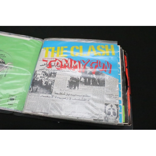 1028 - Vinyl - 18 The Clash 7” singles spanning their career including foreign pressings in folder, to incl... 