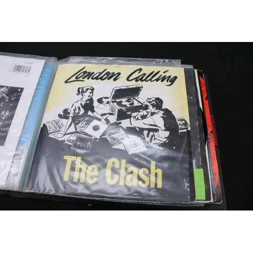 1028 - Vinyl - 18 The Clash 7” singles spanning their career including foreign pressings in folder, to incl... 