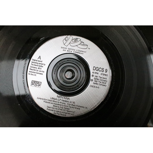 325 - Vinyl - 4 Nirvana UK pressing 7” singles to include: Smells Like Teen Spirit (DGCS 5), Come As You A... 