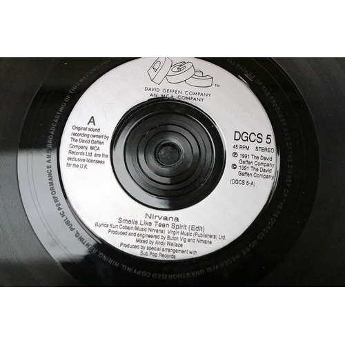 325 - Vinyl - 4 Nirvana UK pressing 7” singles to include: Smells Like Teen Spirit (DGCS 5), Come As You A... 