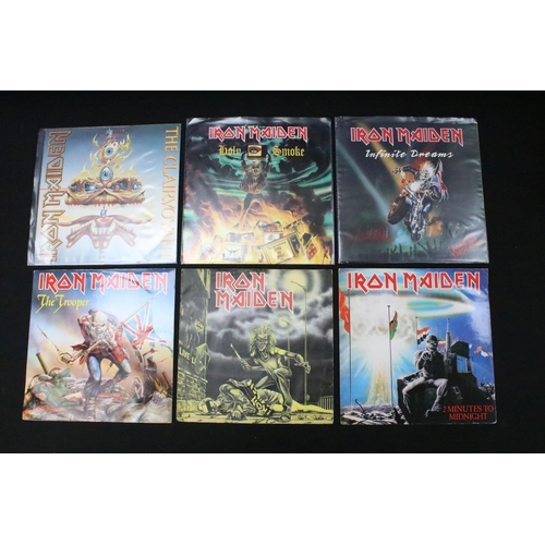 328 - Vinyl - 12 Iron Maiden UK 7” singles and 2 Bruce Dickinson singles spanning their career. Condition ... 