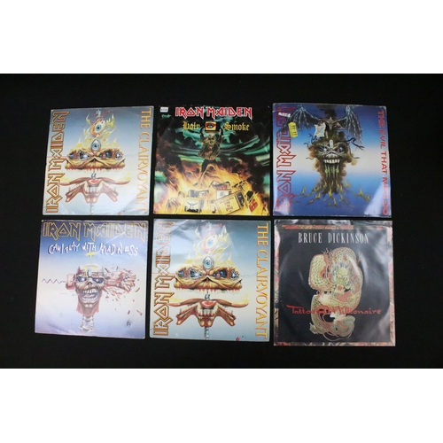 328 - Vinyl - 12 Iron Maiden UK 7” singles and 2 Bruce Dickinson singles spanning their career. Condition ... 