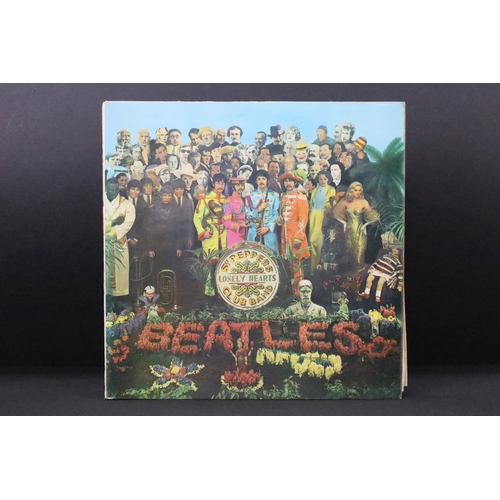 521 - Vinyl - 10 The Beatles LPs to include Please Please Me (yellow Parlophone), Sgt Pepper (red flame in... 