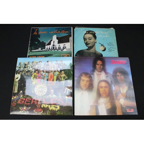 560 - Vinyl - Approx 35 LPs spanning genres and decades to include The Beatles (Sgt Pepper stereo 2 box EM... 