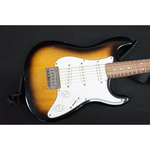 1399 - Guitar - Squire by Fender boxed starter pack including a Squier stratocaster electric guitar, Squire... 