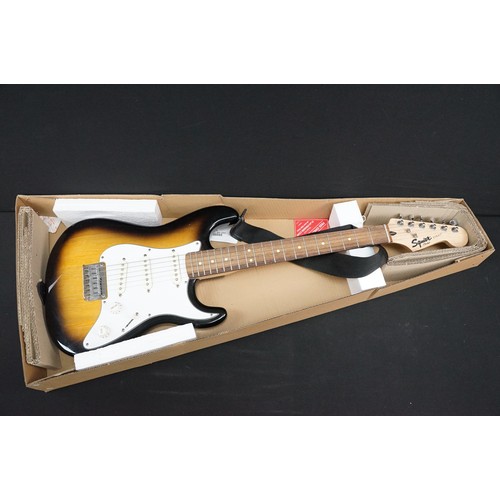 1399 - Guitar - Squire by Fender boxed starter pack including a Squier stratocaster electric guitar, Squire... 