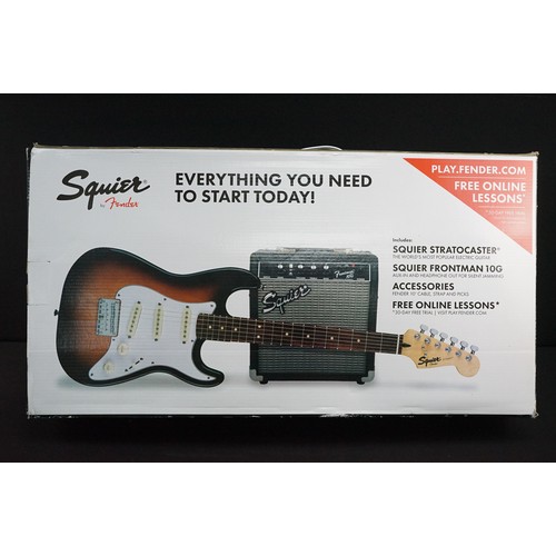 1399 - Guitar - Squire by Fender boxed starter pack including a Squier stratocaster electric guitar, Squire... 