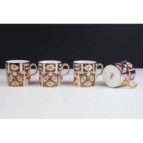 68 - Set of four Royal Crown Derby demitasse coffee cups and saucers in the traditional Imari pattern, 24... 