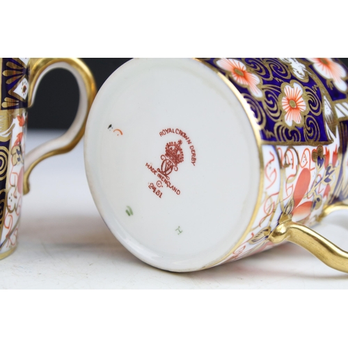 68 - Set of four Royal Crown Derby demitasse coffee cups and saucers in the traditional Imari pattern, 24... 