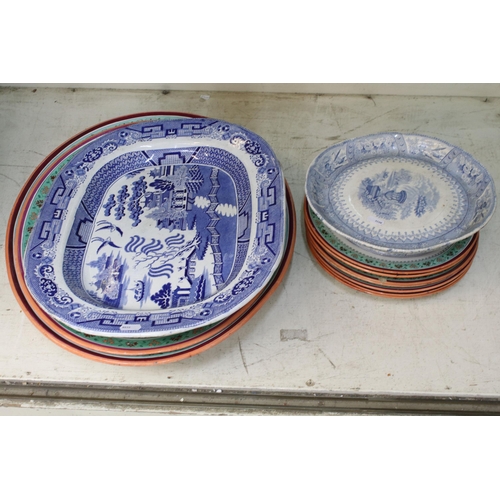 29 - Selection of large meat platter plates, to include Willow pattern Ironstone designs, pagoda scene, b... 