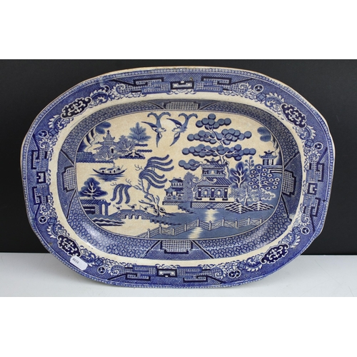 29 - Selection of large meat platter plates, to include Willow pattern Ironstone designs, pagoda scene, b... 