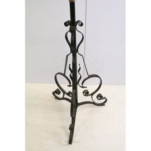 612 - Tall wrought iron and brass oil lamp floor light with glass chimney, H 190cm