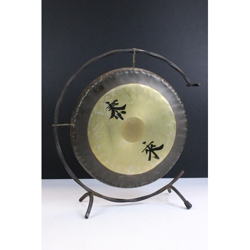 153A - Asian brass gong on stand with character markings to front H 33cm, diameter 25cm together with Chine... 