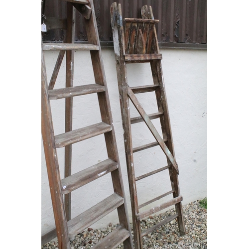 553 - Two sets of tall folding step ladders