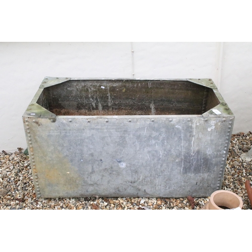 554 - 20th century galvanised steel studded water trough, H 62cm, W 121cm , D 61cm