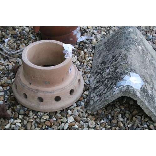 555 - Pair terracotta chimney posts together with a reconstituted stone ridge tile. Tallest chimney pot 29... 