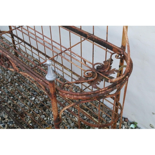 556 - Victorian garden plant shelf unit having five slatted shelves with scrolled foliate details. Measure... 