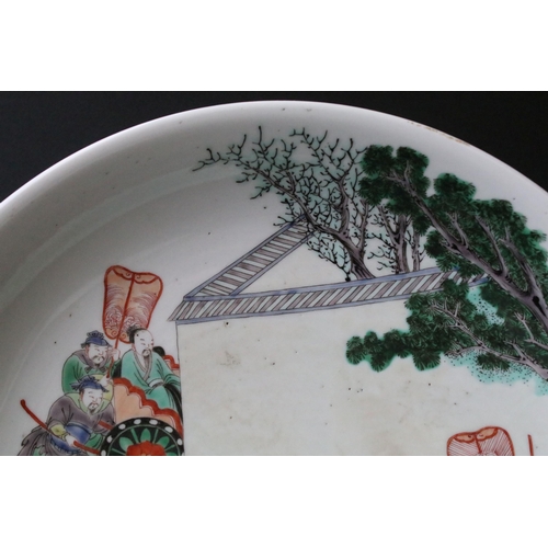 60A - Chinese Kangxi famille verte dish featuring an over glaze hand enamelled scene depicting figures in ... 