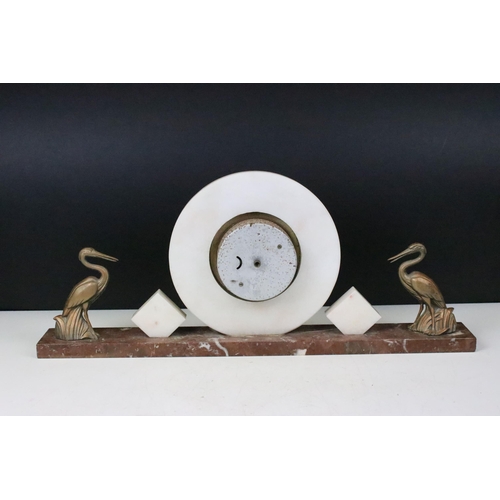 164 - Three Art Deco marble mantle clocks c.1925 -1935 one example with circular face and decorative heron... 