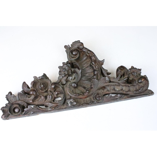 167 - Oak scroll and flower carved architectural fragment, H 25.5cm, W 52cm