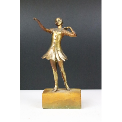 175 - Pair of Art Deco Gilt metal dancing girl figurines set on marble bases, H23cm