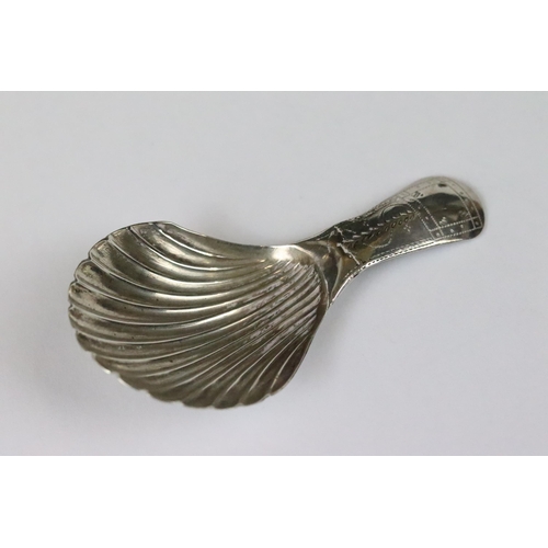 182 - George III silver caddy spoon with bright cut engraved handle and fluted bowl, Birmingham 1803, make... 