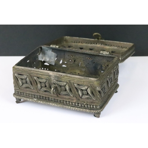 187 - A late 19th to early 20th century Indian Dhokra work brass casket box, measures approx 16cm x 13cm x... 