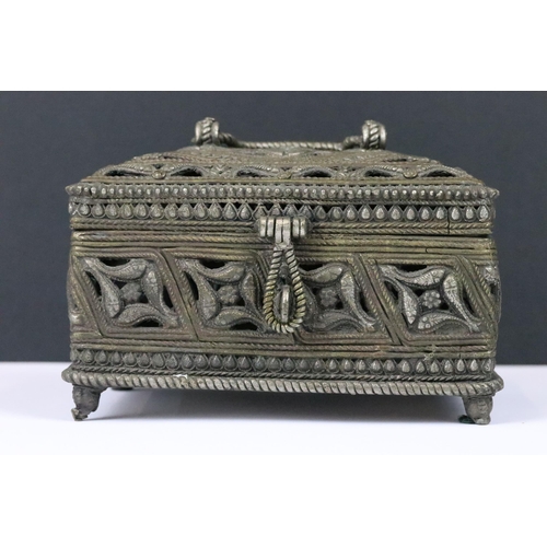 187 - A late 19th to early 20th century Indian Dhokra work brass casket box, measures approx 16cm x 13cm x... 