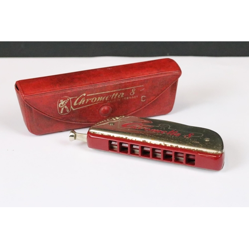 191 - Eight harmonicas including cased Hohner ‘ The Super Chromonic ‘,  cased Hohner Chrometta, cased Vict... 