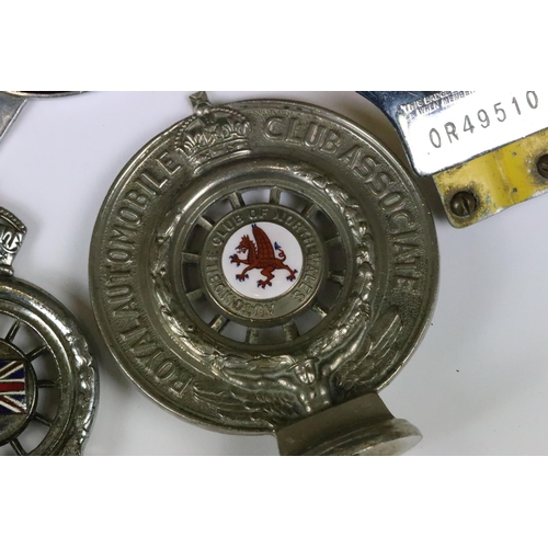 195 - A collection of vintage car grill badges to include Automobile Association (A.A) and early Royal Aut... 