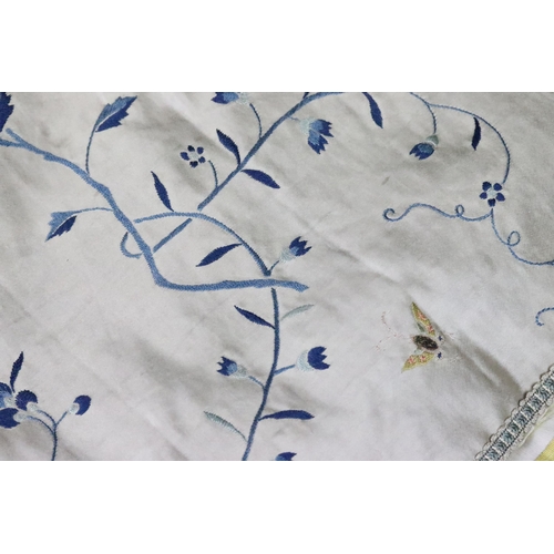 197 - Chinese silk embroidered fabric depicting butterflies and blue flowers and foliage on a cream ground... 