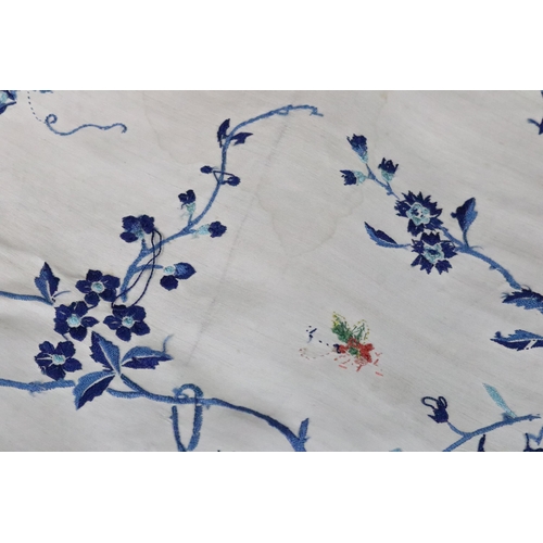 197 - Chinese silk embroidered fabric depicting butterflies and blue flowers and foliage on a cream ground... 