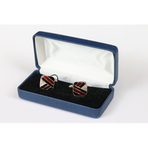 200 - Pair of silver and enamel cufflinks