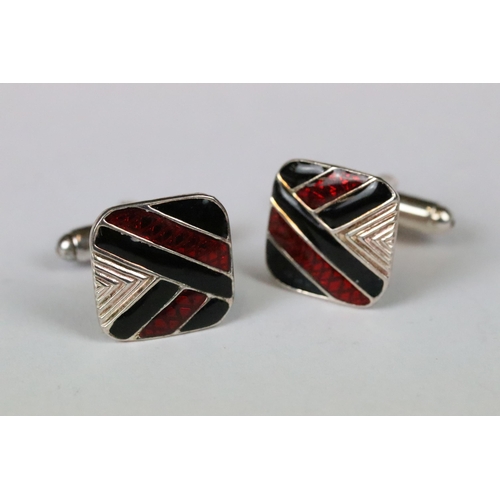 200 - Pair of silver and enamel cufflinks