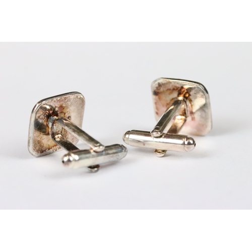 200 - Pair of silver and enamel cufflinks