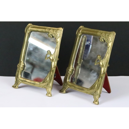 208 - A pair of early to mid 20th century Art Nouveau brass easel back table top mirrors.