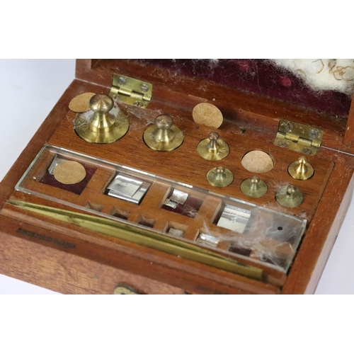 212 - A small group of collectables to include a pair of early 20th century binoculars, a boxed set of wei... 