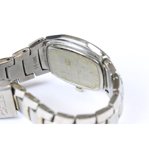 219 - A small collection of three ladies wristwatches to include a Seiko Titanium example.